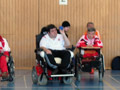 Erich vom Team "Boccia 
						Wien" zielt.